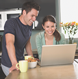 Image of couple reading eNewspaper Product